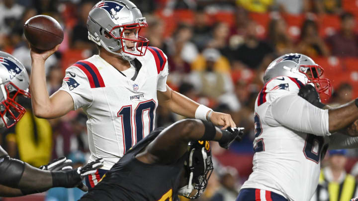 Aug 25, 2024; Landover, Maryland, USA;  New England Patriots quarterback Drake Maye (10) throws fro the pocket during the first half against the Washington Commanders at Commanders Field. Mandatory Credit: Tommy Gilligan-USA TODAY Sports