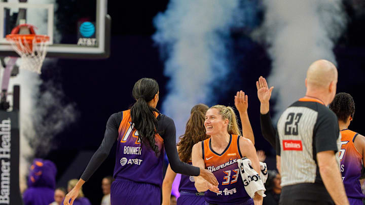 Aug 30, 2025; Phoenix, Arizona, USA; Phoenix Mercury guard Sami Whitcomb (33) and guard-forward DeWanna Bonner (14) celebrate as the Phoenix Mercury pull ahead during the second half against the New York Liberty at Footprint Center. Mandatory Credit: Allan Henry-Imagn Images Aug 30, 2025; Phoenix, Arizona, USA; Phoenix Mercury guard Sami Whitcomb (33) and guard-forward DeWanna Bonner (14) celebrate as the Phoenix Mercury pull ahead during the second half against the New York Liberty at Footprint Center. Mandatory Credit: Allan Henry-Imagn Images