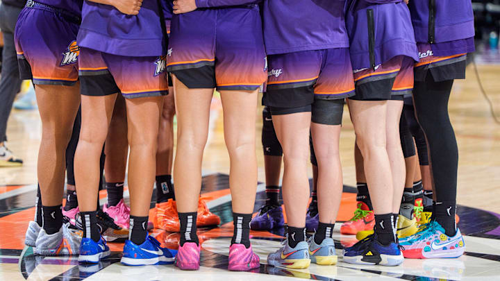 Sep 14, 2025; Phoenix, Arizona, USA; A detailed view as the Phoenix Mercury huddle at mid-court after a loss in overtime to the New York Liberty during game one of the 2025 WNBA Playoffs round one at PHX Arena. Mandatory Credit: Allan Henry-Imagn Images Sep 14, 2025; Phoenix, Arizona, USA; A detailed view as the Phoenix Mercury huddle at mid-court after a loss in overtime to the New York Liberty during game one of the 2025 WNBA Playoffs round one at PHX Arena. Mandatory Credit: Allan Henry-Imagn Images