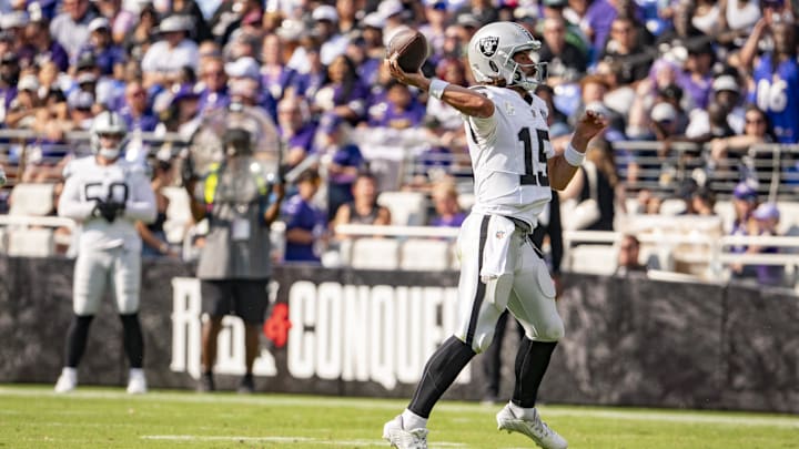 Sep 15, 2024; Baltimore, Maryland, USA;  dLas Vegas Raiders quarterback Gardner Minshew (15) throws on the run uring the second half against the Baltimore Ravens at M&T Bank Stadium. Mandatory Credit: Tommy Gilligan-Imagn Images