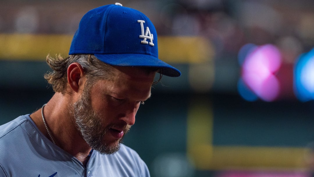 Aug 30, 2024; Phoenix, Arizona, USA;  Los Angeles Dodgers pitcher Clayton Kershaw (22) reacts after pitching change in the second inning during a game against the Arizona Diamondbacks at Chase Field. Mandatory Credit: Allan Henry-USA TODAY Sports