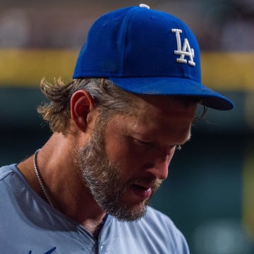 Aug 30, 2024; Phoenix, Arizona, USA;  Los Angeles Dodgers pitcher Clayton Kershaw (22) reacts after pitching change in the second inning during a game against the Arizona Diamondbacks at Chase Field. Mandatory Credit: Allan Henry-USA TODAY Sports