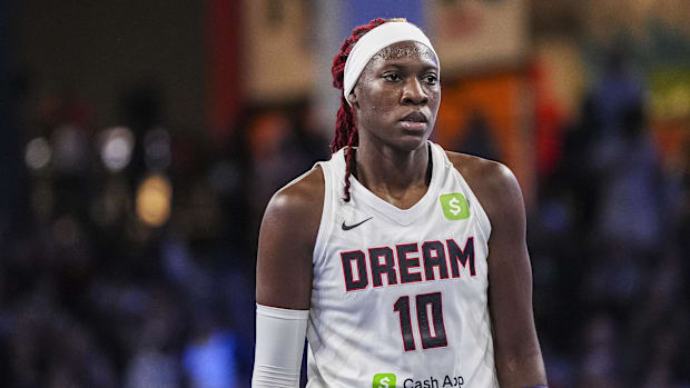 Rhyne Howard looks on