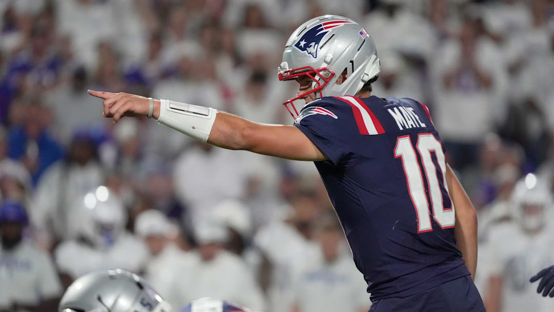 New England Patriots quarterback Drake Maye lets the offense line know what he sees during first half action at Highmark Stadium in Orchard Park on Oct. 5, 2025.