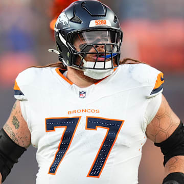 Aug 18, 2024; Denver, Colorado, USA; Denver Broncos guard Quinn Meinerz (77) before the game against the Green Bay Packers at Empower Field at Mile High. 