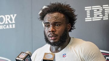 Jul 27, 2023; Flowery Branch, GA, USA; An Atlanta Falcons defensive end Grady Jarrett (97) talks to the media after practice during training camp at IBM Performance Field.