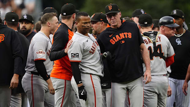 San Francisco Giants designated hitter Rafael Devers (16) and manager Bob Melvin (6) during a bench clearing brawl