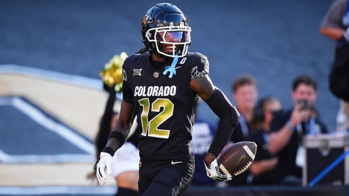 Aug 29, 2024; Boulder, Colorado, USA; Colorado Buffaloes wide receiver Travis Hunter (12) reacts after scoring a touchdown in the first half against the North Dakota State Bison at Folsom Field. 