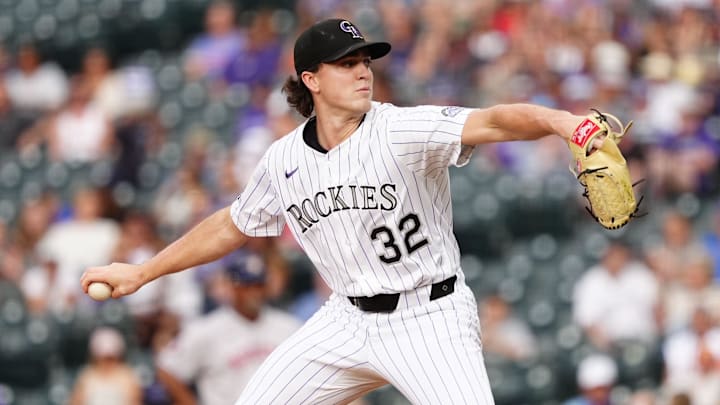 Jul 1, 2025; Denver, Colorado, USA; Colorado Rockies starting pitcher Chase Dollander (32) delivers a pitch against the Houston Astros in the first inning at Coors Field. 