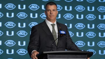 Jul 24, 2024; Charlotte, NC, USA;  Miami Hurricanes head coach Mario Cristobal speaks to the media during the ACC Kickoff at Hilton Charlotte Uptown. Mandatory Credit: Jim Dedmon-USA TODAY Sports