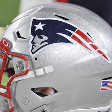 Nov 24, 2022; Minneapolis, Minnesota, USA; A New England Patriots helmet sits idle before the game between the Minnesota Vikings and the Patriots at U.S. Bank Stadium. Mandatory Credit: Jeffrey Becker-Imagn Images