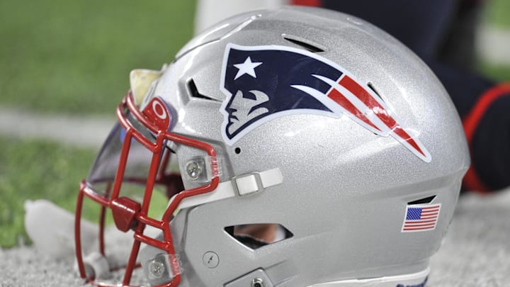 Nov 24, 2022; Minneapolis, Minnesota, USA; A New England Patriots helmet sits idle before the game between the Minnesota Vikings and the Patriots at U.S. Bank Stadium. Mandatory Credit: Jeffrey Becker-Imagn Images