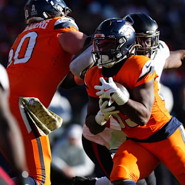 Denver Broncos running back Javonte Williams carries the ball in the first quarter against the Atlanta Falcons.
