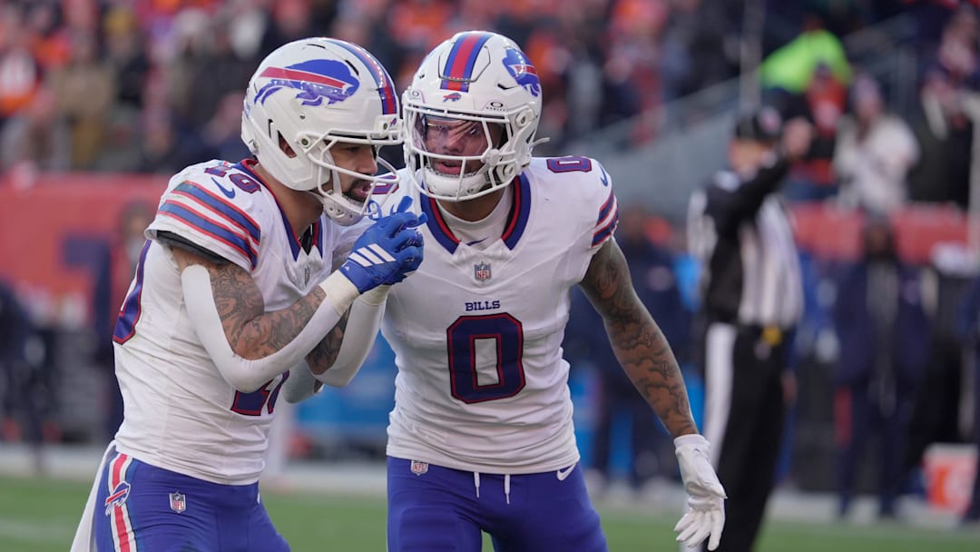 Buffalo Bills wide receiver Keon Coleman checks in with wide receiver Khalil Shakir on the play while they line up during first half action at Empower FIeld at Mile High in Denver, Colorado on Jan. 17, 2026.