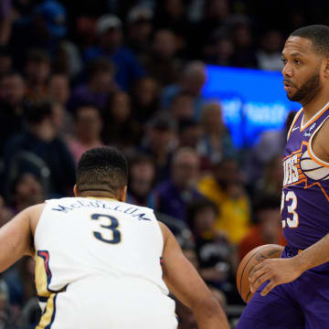 Apr 7, 2024; Phoenix, Arizona, USA;  Phoenix Suns guard Eric Gordon (23) bring the ball down the court against the New Orleans Pelicans in the second half at Footprint Center. Mandatory Credit: Allan Henry-USA TODAY Sports