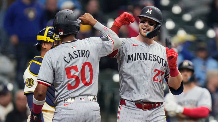 Minnesota Twins catcher Ryan Jeffers (27) homers (1) on a fly ball to left center field allowing Minnesota Twins center fielder Willi Castro (50) to score during the seventh inning of the game on Wednesday April 3, 2024 at American Family Field in Milwaukee, Wis.