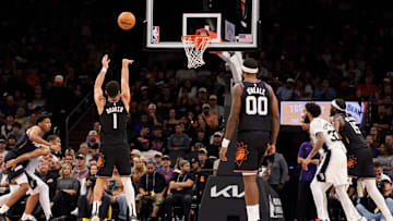 Nov 2, 2025; Phoenix, Arizona, USA; Phoenix Suns guard Devin Booker (1) shoots a free throw during the second half against the San Antonio Spurs at Mortgage Matchup Center. Mandatory Credit: Allan Henry-Imagn Images