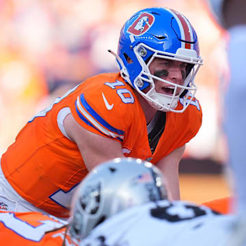 Oct 6, 2024; Denver, Colorado, USA; Denver Broncos quarterback Bo Nix (10) during the fourth quarter against the Las Vegas Raiders at Empower Field at Mile High.