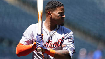 Detroit Tigers third baseman Andy Ibanez (77) warms up before the game against the Colorado Rockies at Coors Field.