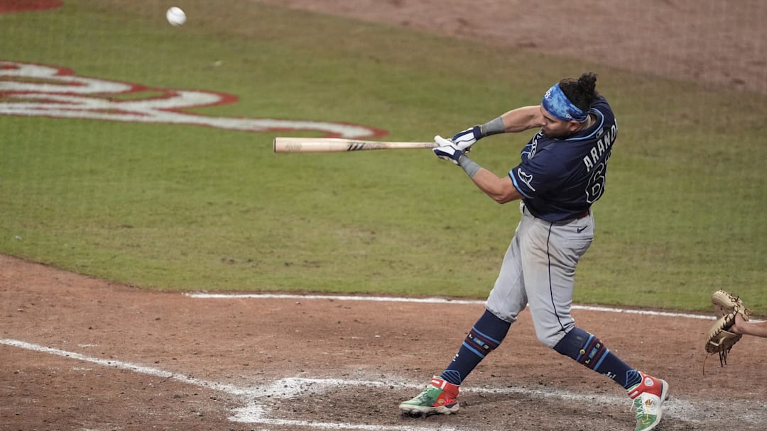 Cumberland, Georgia, USA; American League infielder Jonathan Aranda (62) of the Tampa Bay Rays hits a home run in the swing off after the 2025 MLB All-Star Game ended in a tie at Truist Park. Cumberland, Georgia, USA; American League infielder Jonathan Aranda (62) of the Tampa Bay Rays hits a home run in the swing off after the 2025 MLB All-Star Game ended in a tie at Truist Park.
