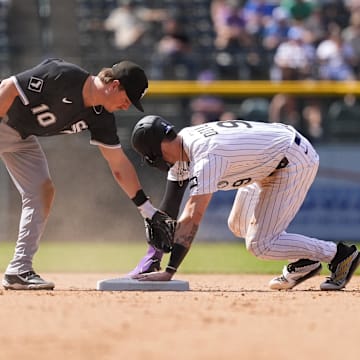Colorado Rockies pinch hitter Brenton Doyle steals second base against the Chicago White Sox