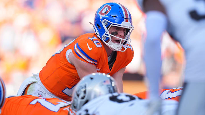 Oct 6, 2024; Denver, Colorado, USA; Denver Broncos quarterback Bo Nix (10) during the fourth quarter against the Las Vegas Raiders at Empower Field at Mile High. 