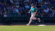 Mar 8, 2025; Mesa, Arizona, USA; Seattle Mariners infielder Colt Emerson (85) hits a home run in the top of the ninth during a spring training game against the Chicago Cubs at Sloan Park. Mandatory Credit: Allan Henry-Imagn Images