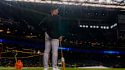 Aug 8, 2025; Phoenix, Arizona, USA; Colorado Rockies interim manager Warren Schaeffer (32) watches on from the infield as he team warms up for a game against the Arizona Diamondbacks at Chase Field.