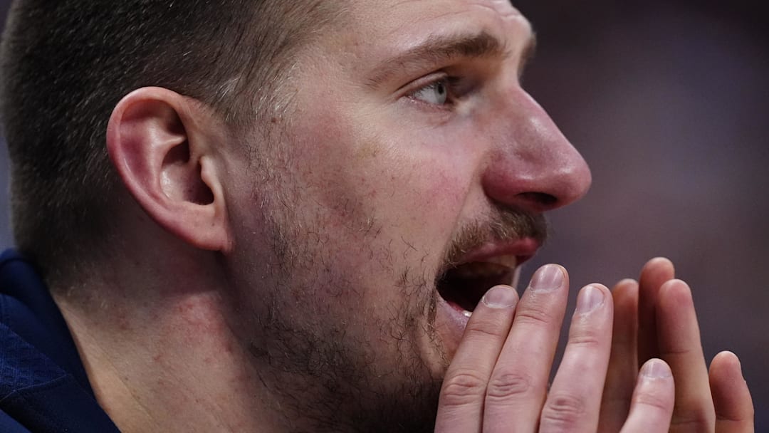 Feb 9, 2026; Denver, Colorado, USA; Denver Nuggets center Nikola Jokic (15) calls out from the bench in the second quarter against the Cleveland Cavaliers at Ball Arena. Mandatory Credit: Ron Chenoy-Imagn Images