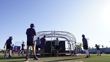 TCU baseball players taking batting practice before their game against Arizona.