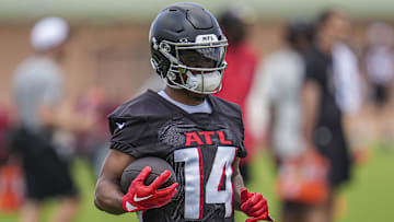 Jun 3, 2024; Atlanta, GA, USA; Atlanta Falcons wide receiver Rondale Moore (14) runs with the ball during Falcons OTA at the Falcons Training facility. Mandatory Credit: Dale Zanine-Imagn Images
