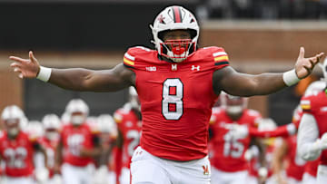 Sep 7, 2024; College Park, Maryland, USA;  Maryland Terrapins defensive lineman Jordan Phillips (8) takes the field before the game against the Michigan State Spartans at SECU Stadium. Mandatory Credit: Tommy Gilligan-Imagn Images