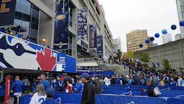 Oct 25, 2025; Toronto, Ontario, CAN; Fans arrive before game two of the 2025 MLB World Series between the Toronto Blue Jays and the Los Angeles Dodgers at Rogers Centre. Mandatory Credit: John E. Sokolowski-Imagn Images