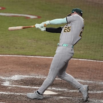 National League designated hitter Brent Rooker (25) of the Athletics hits a home run during the swing off after the 2025 MLB All Star Game ended in a tie.