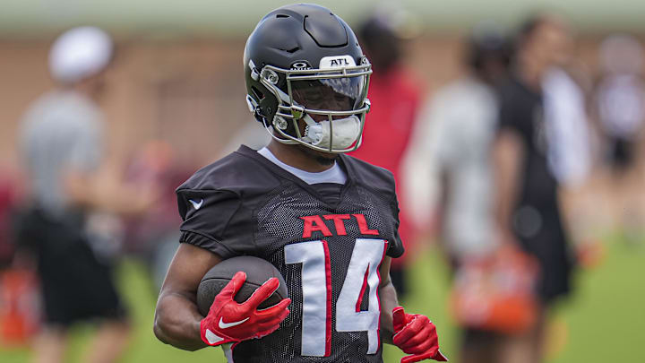 Jun 3, 2024; Atlanta, GA, USA; Atlanta Falcons wide receiver Rondale Moore (14) runs with the ball during Falcons OTA at the Falcons Training facility. Mandatory Credit: Dale Zanine-Imagn Images