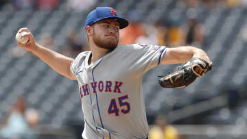 Jul 8, 2024; Pittsburgh, Pennsylvania, USA;  New York Mets starting pitcher Christian Scott (45) delivers a pitch against the Pittsburgh Pirates during the first inning  at PNC Park. Mandatory Credit: Charles LeClaire-USA TODAY Sports