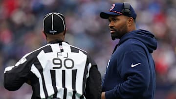 Dec 28, 2024; Foxborough, Massachusetts, USA; New England Patriots head coach Jerod Mayo talks with an official from the sideline as they take on the Los Angeles Chargers at Gillette Stadium.