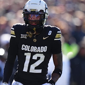 Nov 29, 2024; Boulder, Colorado, USA; Colorado Buffaloes wide receiver Travis Hunter (12) during the first quarter against the Oklahoma State Cowboys  at Folsom Field. Mandatory Credit: Ron Chenoy-Imagn Images