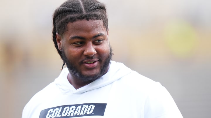 Jordan Seaton got a special pep talk from Bill Goldberg before his first game with the Colorado football program