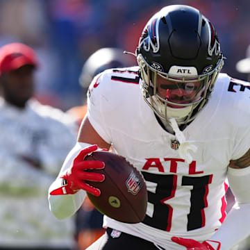Nov 17, 2024; Denver, Colorado, USA; Atlanta Falcons safety Justin Simmons (31) warms up before the game against the Denver Broncos at Empower Field at Mile High. Mandatory Credit: Ron Chenoy-Imagn Images