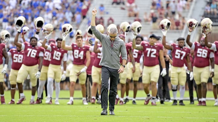 Sep 14, 2024; Tallahassee, Florida, USA; Florida State Seminoles head coach Mike Norvell leads his team before a game against the Memphis Tigers at Doak S. Campbell Stadium. Mandatory Credit: Melina Myers-Imagn Images