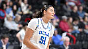 Mar 30, 2025; Spokane, WA, USA; UCLA Bruins center Lauren Betts (51) stretches before a the Elite 8 NCAA Tournament basketball game against the LSU Lady Tigers at Spokane Arena. Mandatory Credit: James Snook-Imagn Images