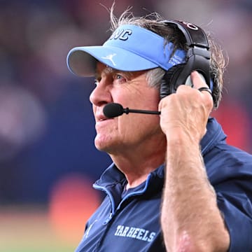 Oct 31, 2025; Syracuse, New York, USA; North Carolina Tar Heels head coach Bill Belichick looks to the clock in the fourth quarter game against the Syracuse Orange at the JMA Wireless Dome. Mandatory Credit: Mark Konezny-Imagn Images