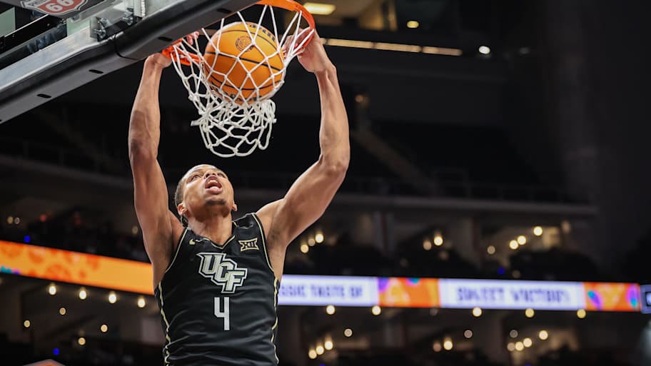 UCF guard Keyshawn Hall dunks the ball last season.