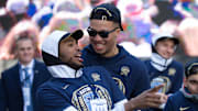 Apr 5, 2018; Philadelphia, PA, USA; Villanova Wildcats guard Jalen Brunson (R) jokes around with guard Mikal Bridges (L) during the championship parade at Dilworth Park. Mandatory Credit: Bill Streicher-USA TODAY Sports
