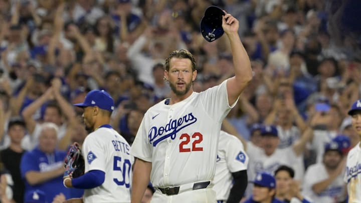  Los Angeles Dodgers starting pitcher Clayton Kershaw acknowledges the crowd after striking out Chicago White Sox third baseman Vinny Capra for his 3000th career strike in the fifth inning at Dodger Stadium. 