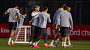 Salah and Alexander-Arnold were pulled apart by teammates