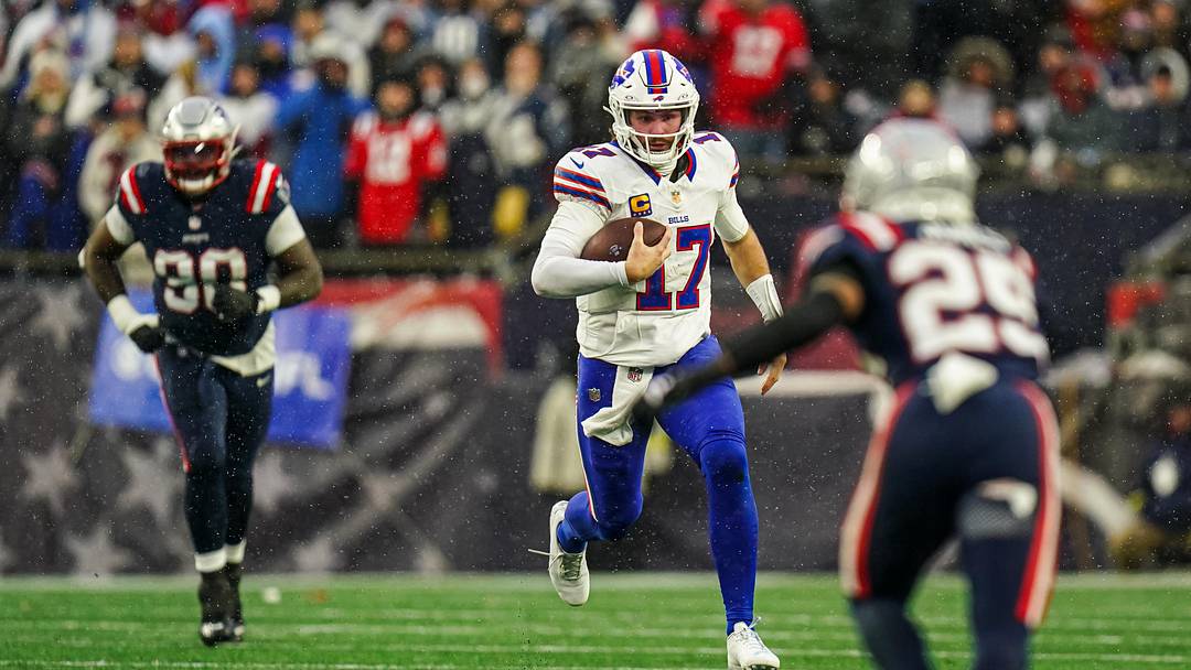Dec 14, 2025; Foxborough, Massachusetts, USA; Buffalo Bills quarterback Josh Allen (17) runs the ball against the New England Patriots in the second half at Gillette Stadium. Mandatory Credit: David Butler II-Imagn Images