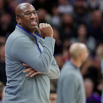 Dec 2, 2023; Sacramento, California, USA; Sacramento Kings head coach Mike Brown smiles during the fourth quarter against the Denver Nuggets at Golden 1 Center. Mandatory Credit: Sergio Estrada-Imagn Images