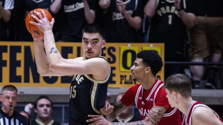 Feb 10, 2024; West Lafayette, Indiana, USA; Purdue Boilermakers center Zach Edey (15) holds the ball while Indiana Hoosiers center Kel'el Ware (1) defends in the first half at Mackey Arena. Mandatory Credit: Trevor Ruszkowski-USA TODAY Sports
